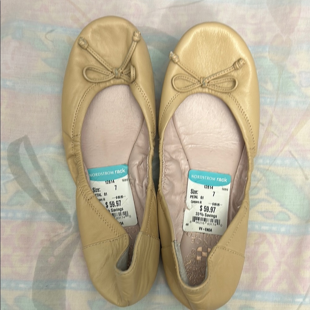 Vince Camuto Tan Ballet Flats. Brand new with tags. Size 7.
